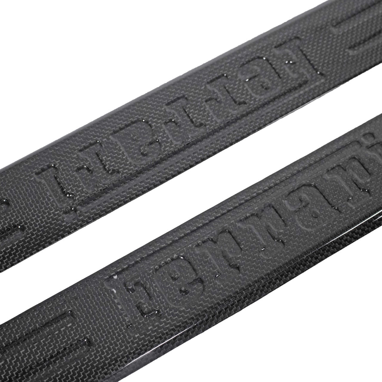 Carbon Fiber Right and Left Embossed Door Sill Trim - Ferrari 488 GTB/Spider